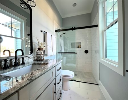 Guest_bathroom_Stairwell_in_a_Reeves_Custom_Homes.JPG